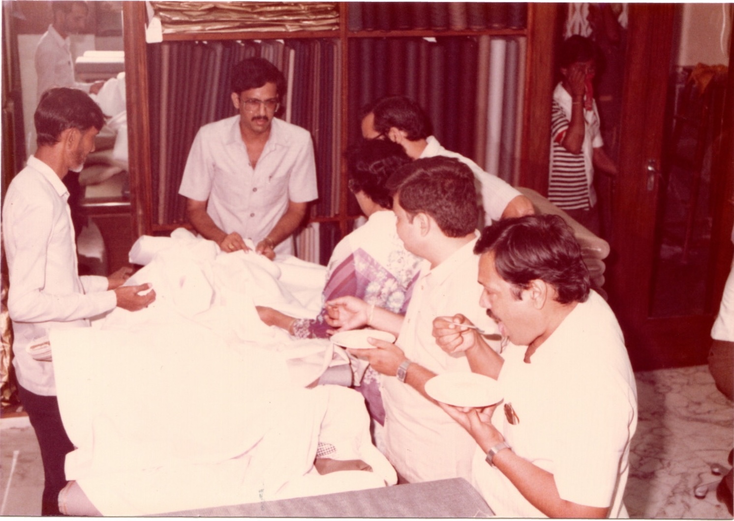 Woolco team members and customers in the original showroom