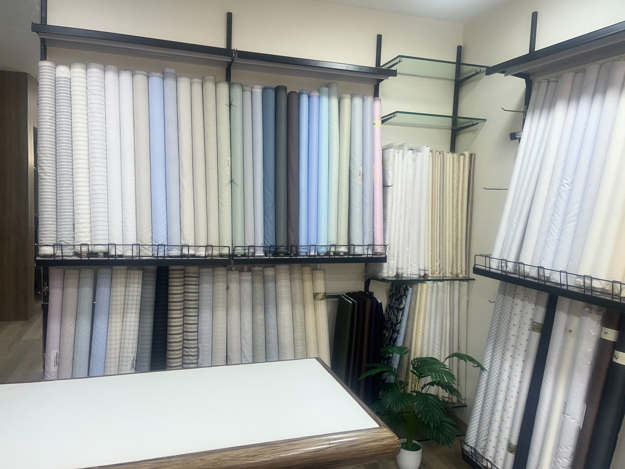 Fabric rolls displayed in the Woolco textiles showroom
